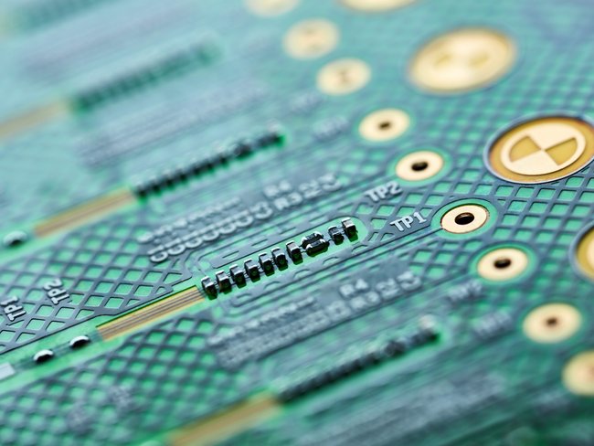 Close-up of printed circuit board (PCB) with Cicor DenciTec technology