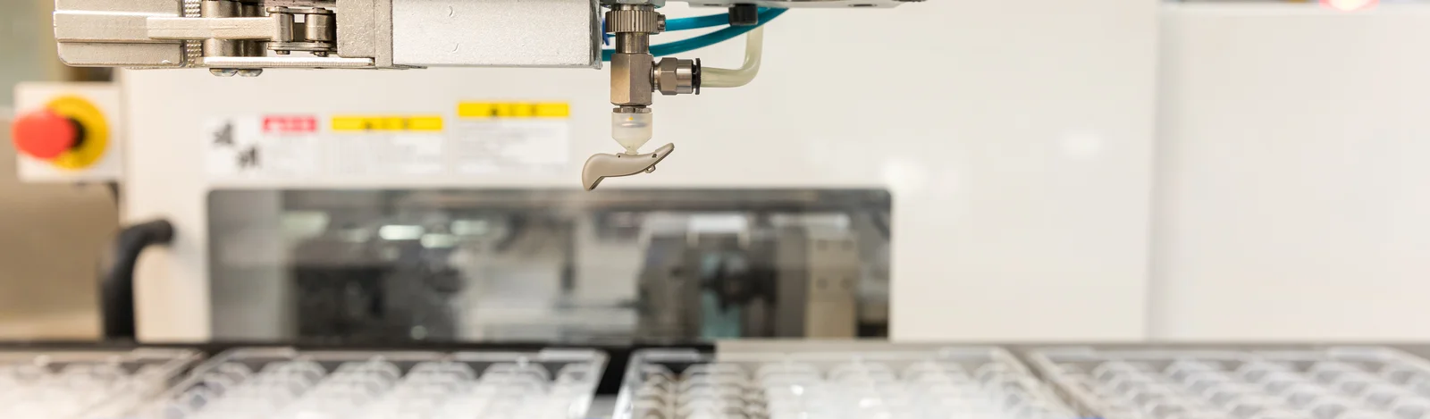 Plastic injection molding of a hearing aid component at the Cicor site in Batam