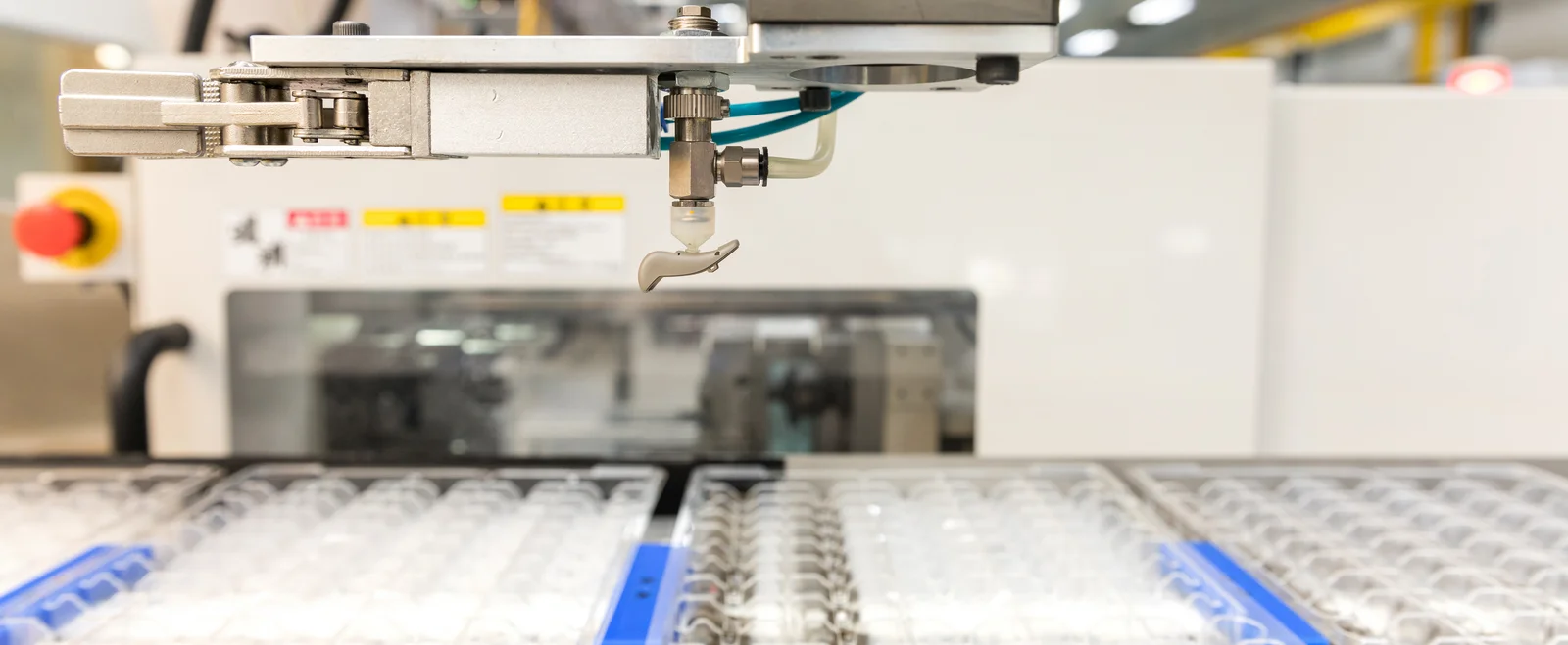 Plastic injection molding of a hearing aid component at the Cicor site in Batam