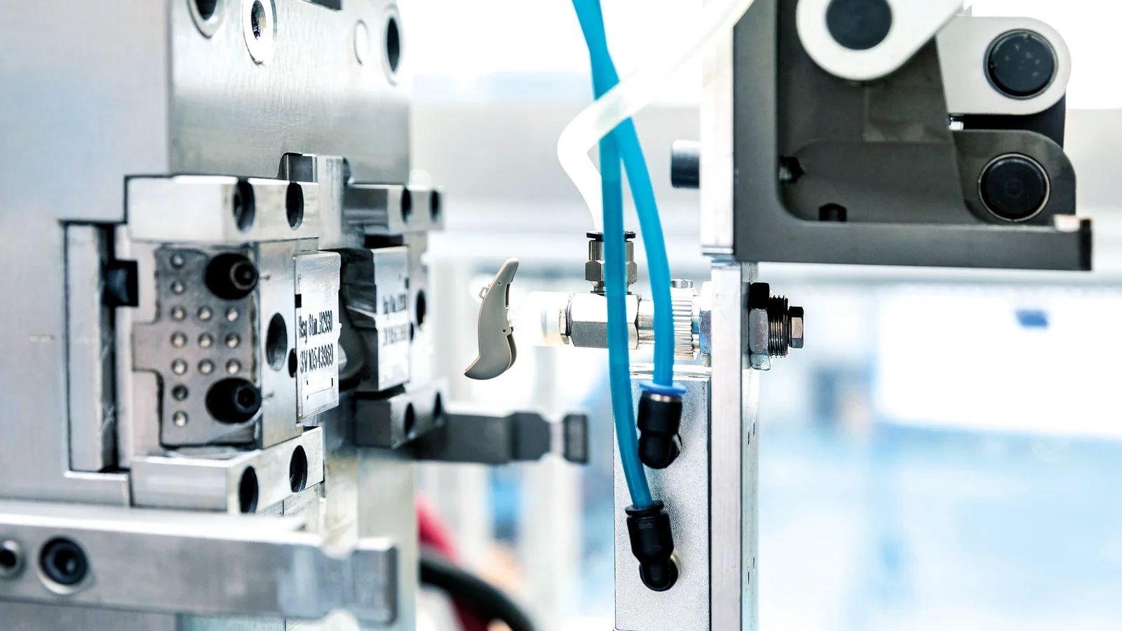 Plastic injection molding of a hearing aid component at the Cicor site in Batam