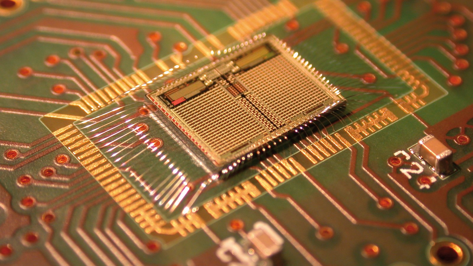 Close-up of bonded bare die (microelectronic assembly)