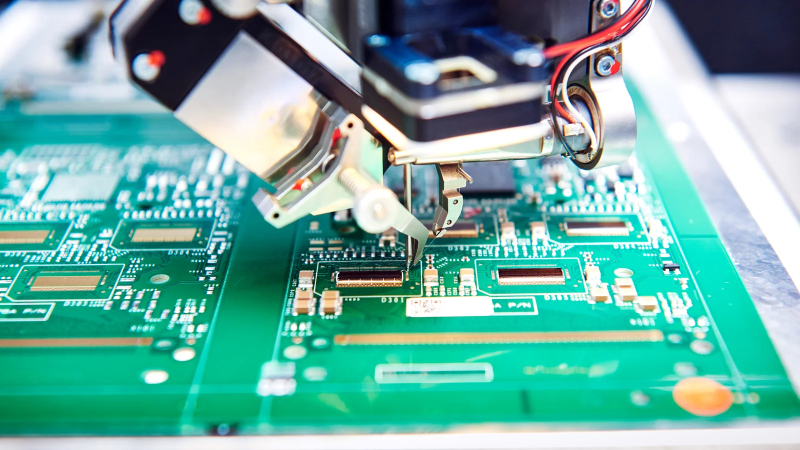 Close-up of wire bonding, part of Cicor's microelectronics assembly services